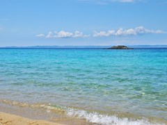 Kalogria beach in Sithonia, Chalkidiki, Greece, with a view on Kassandra peninsula.