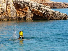 Flippers-of-a-diver.-Zakynthos-island,-Greece.