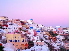 small-Oia village buildings in the evening light