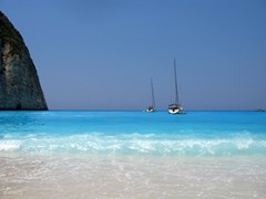small-beach and sail boats in Greece