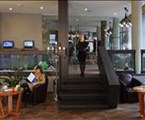 Wellton Centrum Hotel & Spa: Лобби отеля с аквариумами океанической рыбы